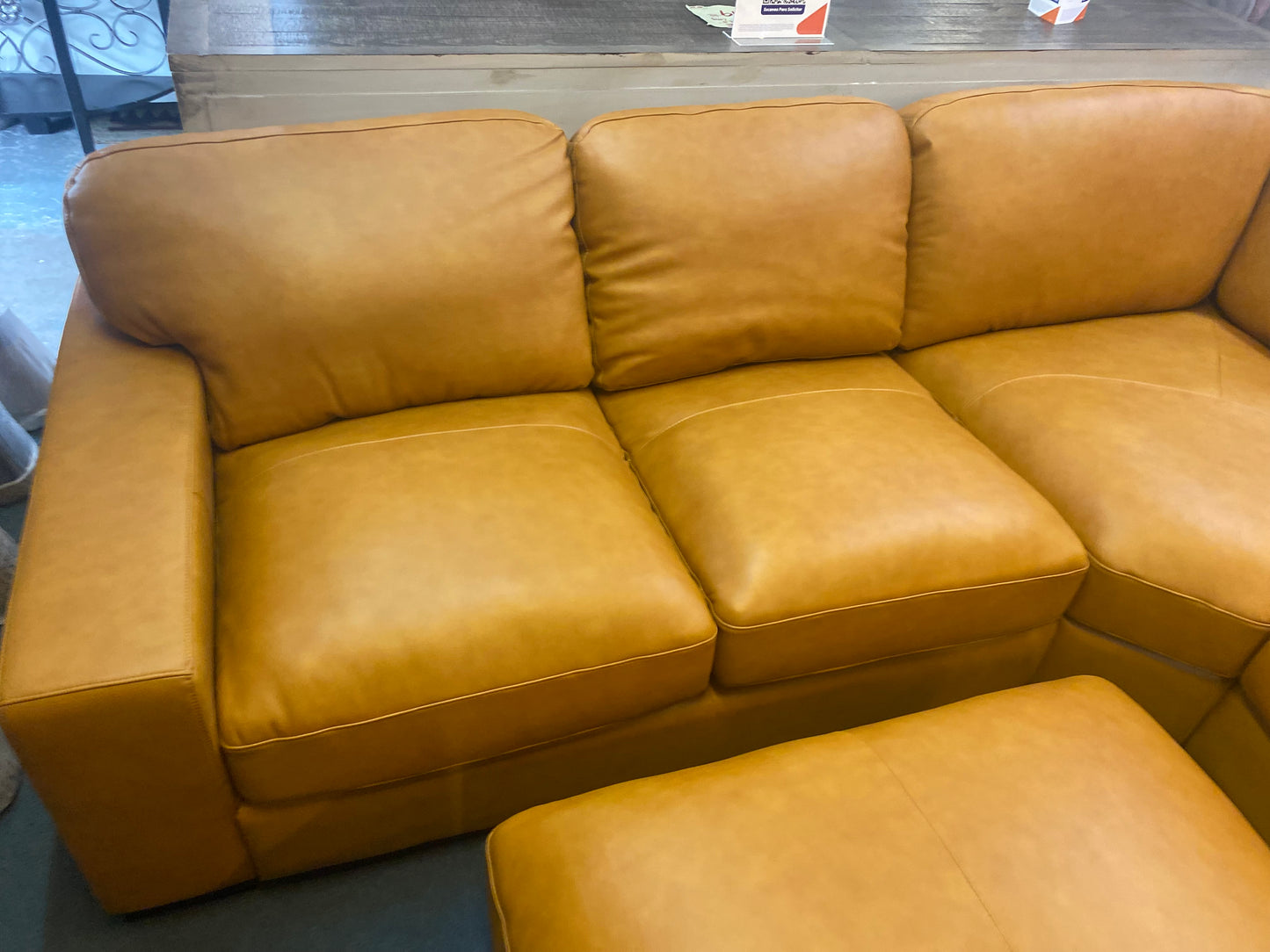 Real-Leather Sectional With Ottoman